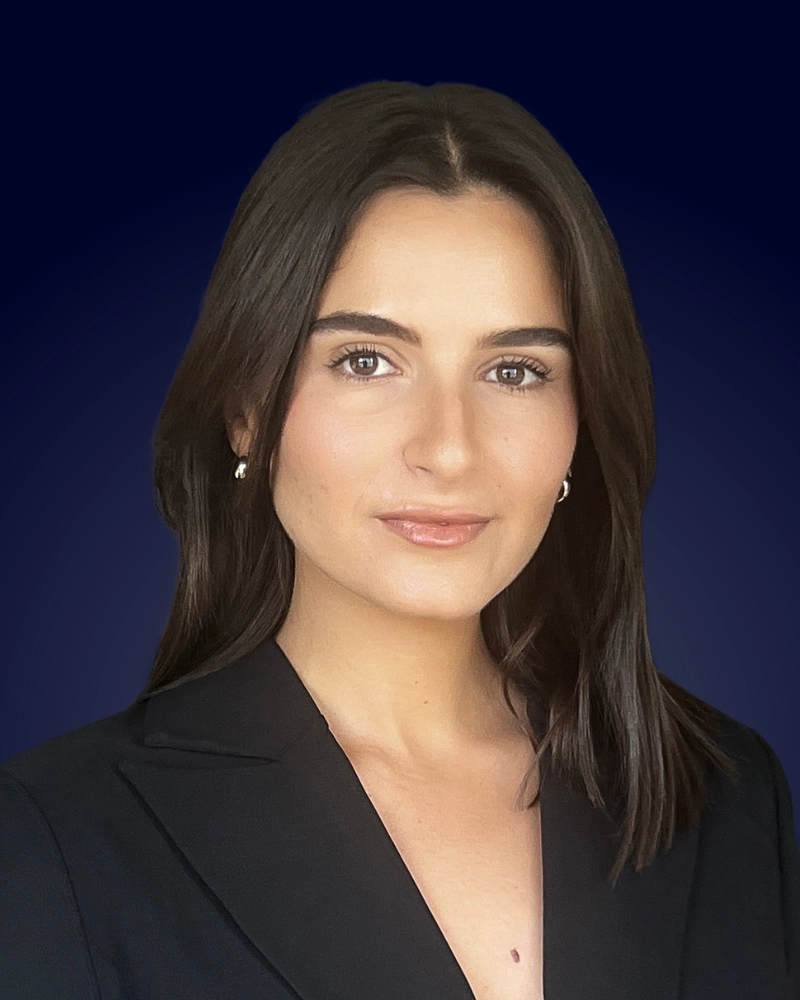 professional headshot with navy background showing quality that virtual headshot services can deliver