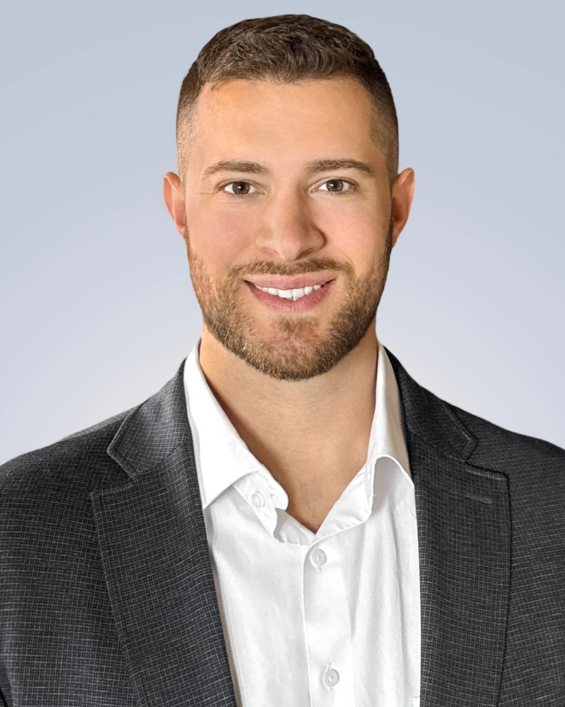 modern minimalist black and white professional headshot on gray background