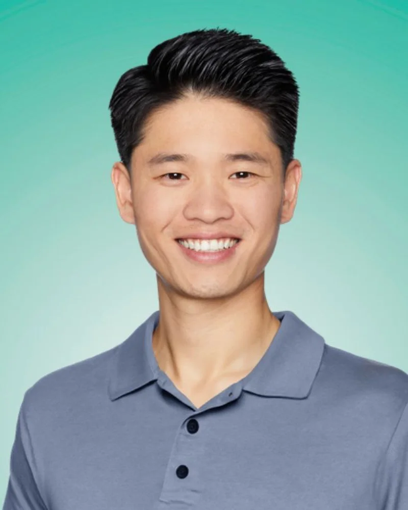 casual headshot pose for tech professional with relaxed natural expression