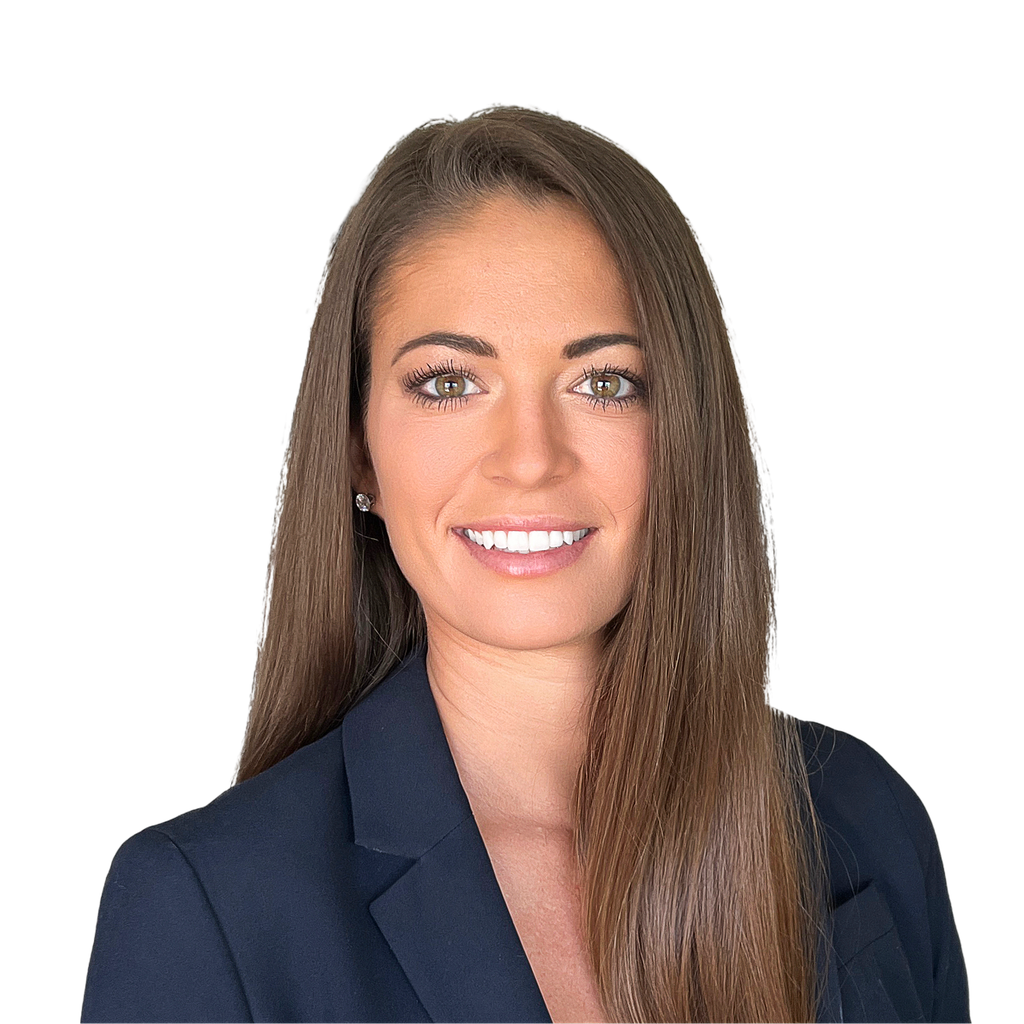 28. Female AmLaw partner. Smiling young adult woman in a dark blazer poses for a professional headshot against a clean white background