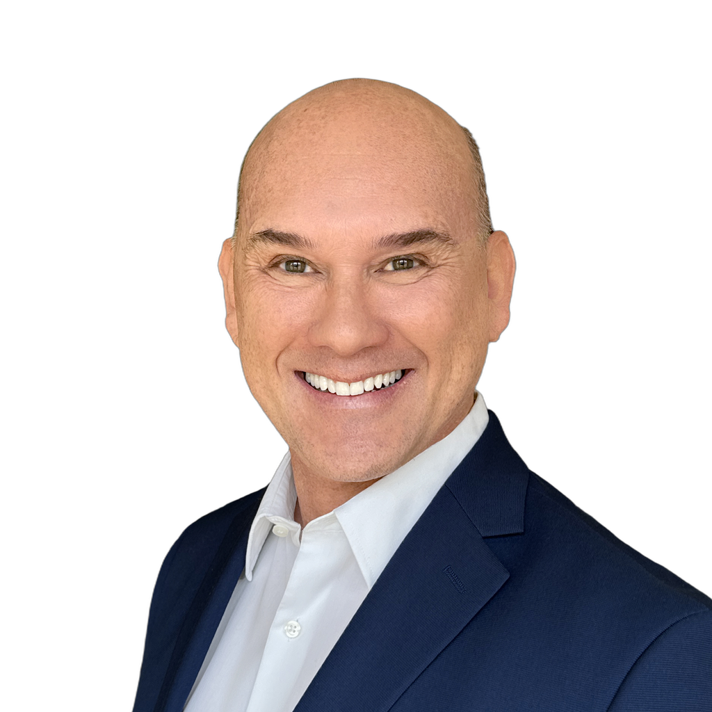 29. Trial lawyer. Smiling middle-aged man in a dark blue suit jacket and white shirt against a textured gray background