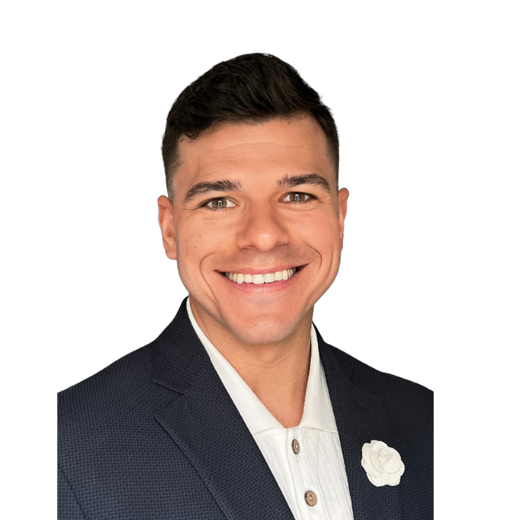 48. College professor. Smiling man in a dark suit jacket and light textured shirt, set against a light blue virtual background